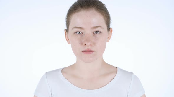 Portrait of Young Redhead Woman in Studio alt