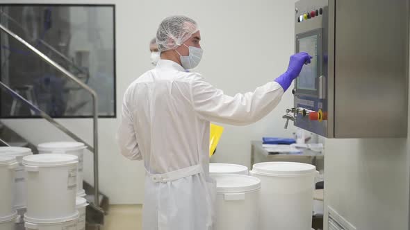 Pharmacist Control Pharmaceutical Manufacturing Process at Drug Factory alt