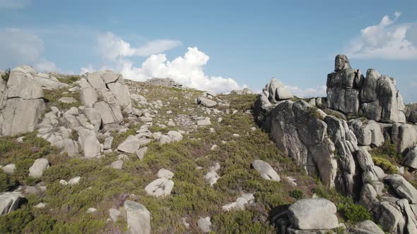 Exploring rugged and rocky hiking trail in Geres National Park, Portugal