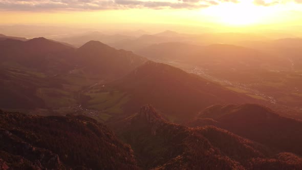 Beautiful Summer Alpine Mountain Landscape in the Glow of the Setting Sun Aerial View in