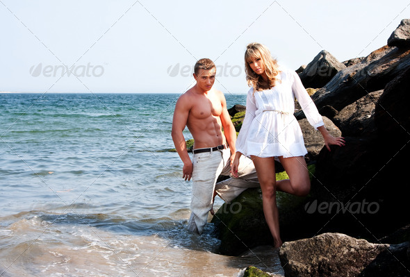 Fashion models at beach - Stock Photo - Images