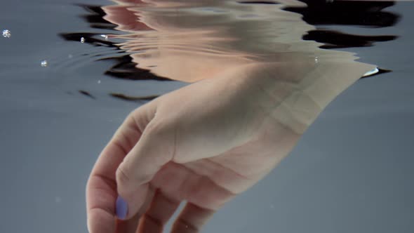 Hand Movement Under Water, Reflecting Water Surface