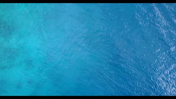 Aerial view landscape of perfect coast beach trip by shallow lagoon and white sandy background of a  alt