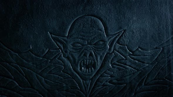 Demon Stone Carving In Heavy Rainfall alt