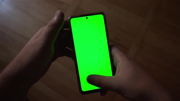 A Mobile Phone With A Green Screen