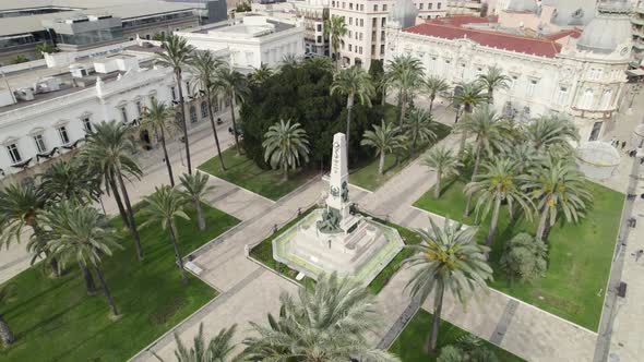 Topdown view Plaza Héroes de Cavite with monument war statue, near Cartagena Port, Spain