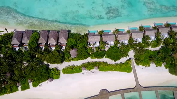 Drone view scenery of exotic resort beach by blue ocean with sand background alt
