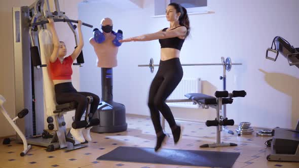 Concentrated Slim Young Woman Running in Place As Beautiful Fit Caucasian Millennial Training alt