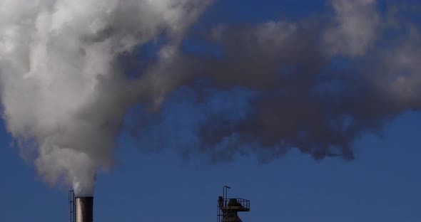 Smokestack of Sugar Refinery with Water Vapour, Near Caen in Normandy, Real Time 4K alt