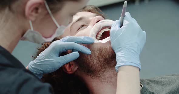 Portrait of a Young Man in a Dentist Chair  alt