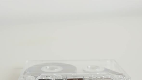 Slow tilt over analogue magnetic tape 4K 2160p 30fps UltraHD footage - Vintage transparent  compact  alt