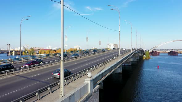 City Traffic on the Bridge at the Autumn