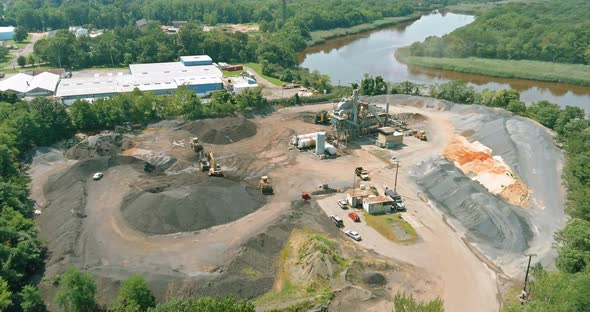 A Mixture of Bitumen and Gravel for Asphalt Concrete Plant a Mix Machine Equipment Production alt