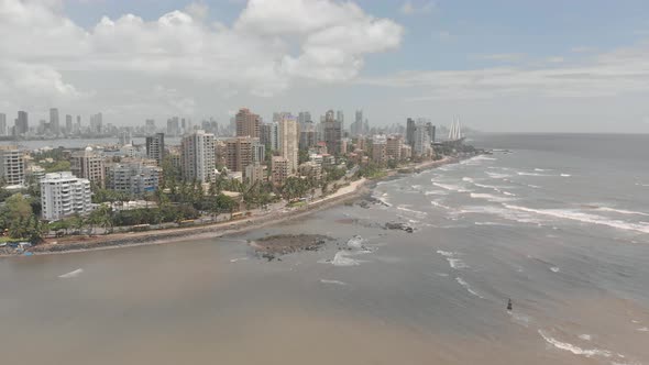 Drone shot over seaside city alt