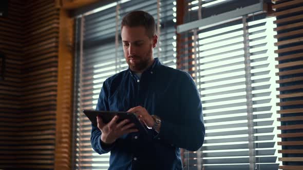 Businessman checking bitcoin price chart on digital exchange on mobile phone screen, cryptocurrency alt