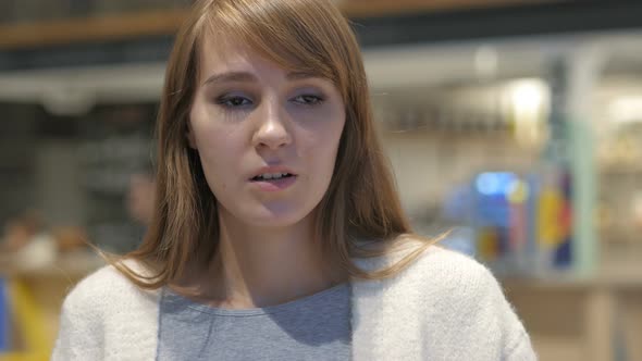 Frightened Young Woman Feeling Scary and Confused alt