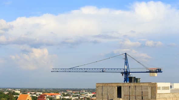 4k Time-lapse of construction cranes with cloud and sky alt