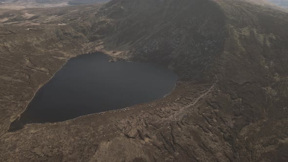 Heart-shape Lake Of Lough Ouler At Wicklow Mountains In Ireland. - aerial alt