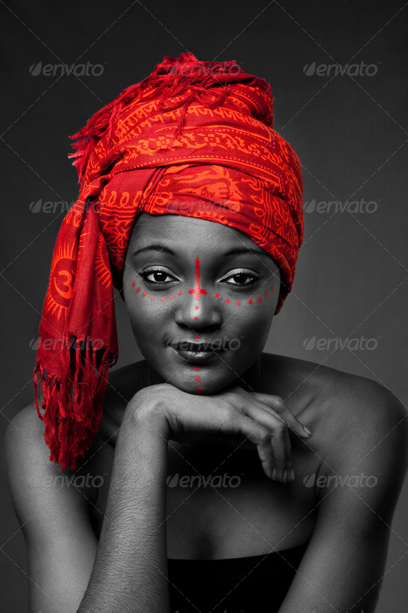 Tribal African woman with headwrap - Stock Photo - Images