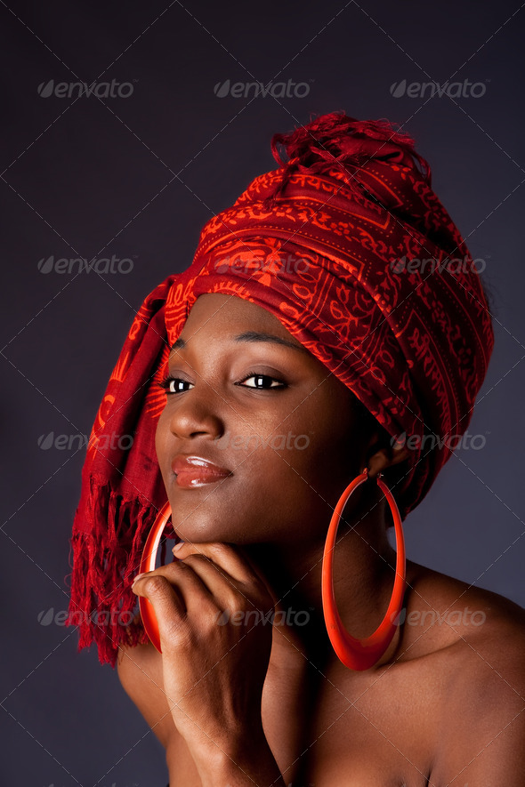 African woman with headwrap - Stock Photo - Images
