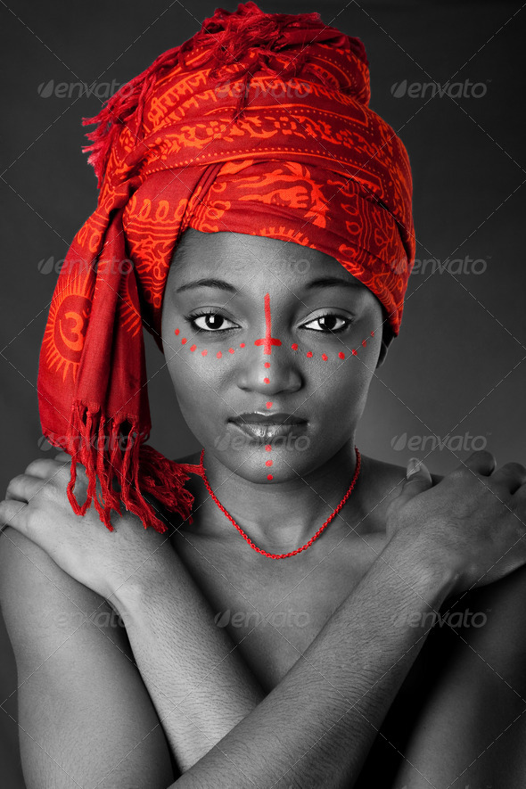 Tribal African woman with headwrap - Stock Photo - Images