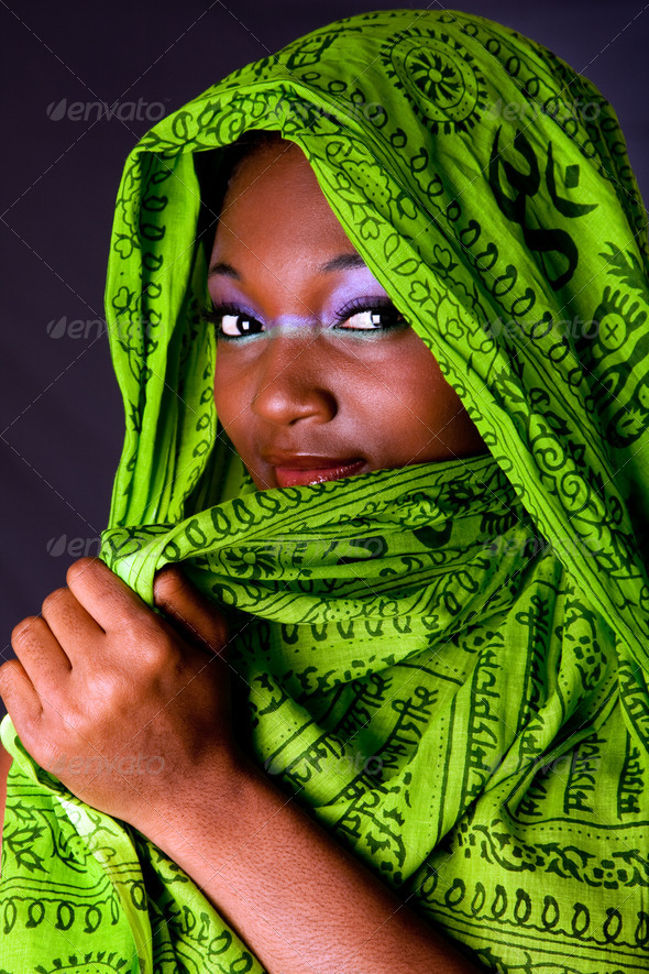 Shy African woman with scarf - Stock Photo - Images