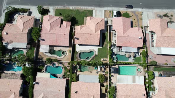 Drone Rises Up From Girl In Pool