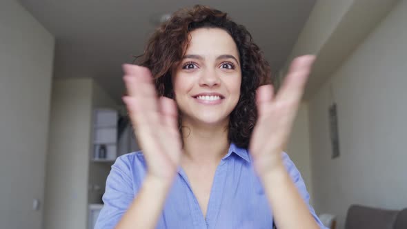 Closeup Portrait of Beautiful Smiling Young Woman Looking at Camera at Home alt