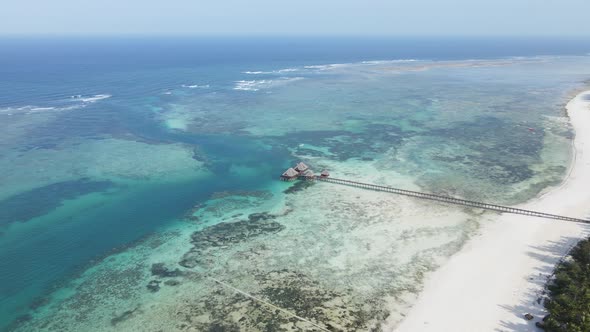 House on Stilts in the Ocean on the Coast of Zanzibar Tanzania alt