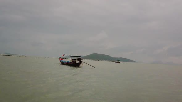 Aerial Sea View and Flying Over Fishing Boat on Thai Island