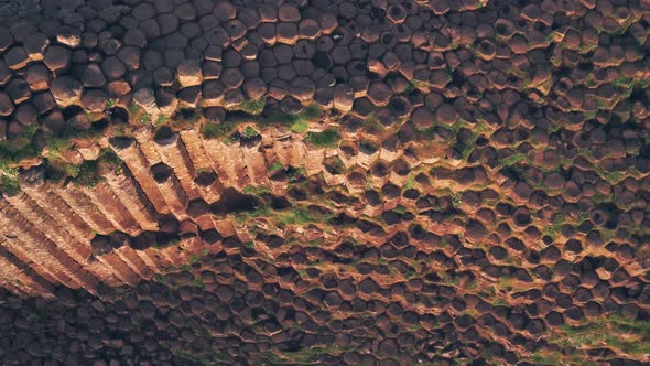 Giants Causeway on Antrim Coast of Northern Ireland. Top down aerial drone view alt