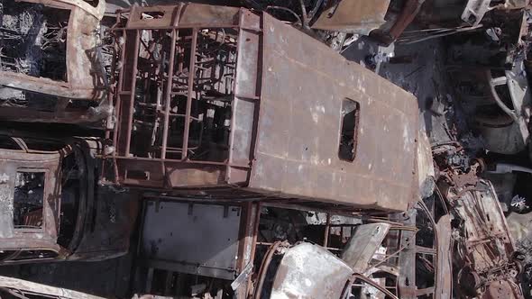 Vertical Video of a Dump of Wardestroyed Cars in Ukraine alt