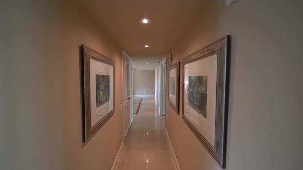 Walking Through A Corridor House Hallway