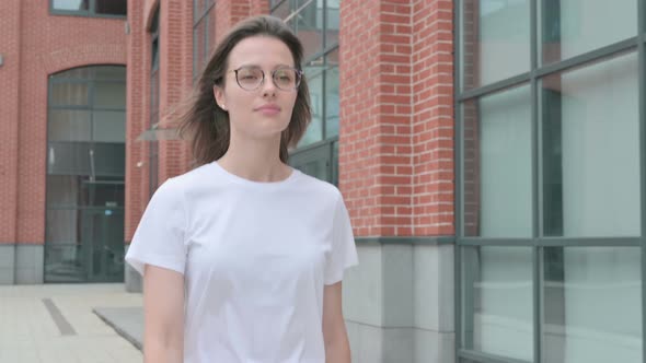 Close up of Woman Walking on Street, Front Pose alt