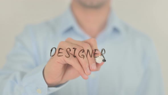 Designer, Man Writing on Transparent Screen alt