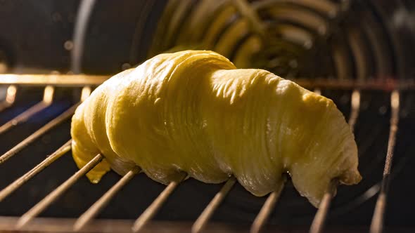 Homemade Croissant Being Bake In Oven With Melted Butter Dripping From Bread. - hyperlapse alt