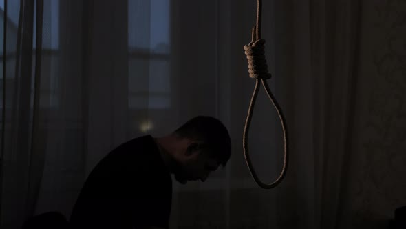 Depressed Man Contemplating Suicide alt