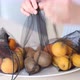 Woman Lays Out Fruits in Eco Bags in the Kitchen - VideoHive Item for Sale