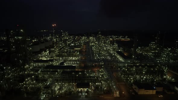 Cinematic Aerial Drone Night Shot Oil refinery petrochemical Plant Complex