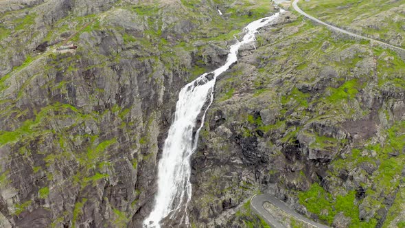 Aerial View Of Stigfossen Waterfall At The Rocky Cliff In More Og Romsdal County, Norway. alt