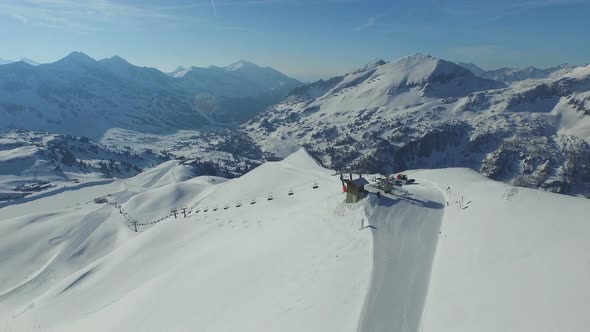 Aerial Ski Lift in Winter Mountains alt