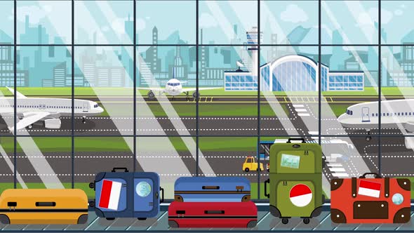 Luggage with Indonesian Flag Stickers on Baggage Carousel alt