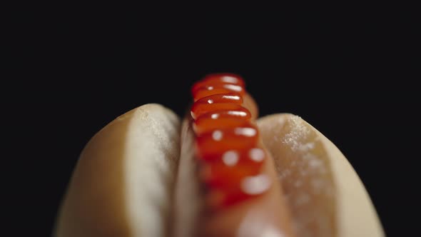 Hot Dog With Sausage And Tomato Ketchup In A White Bread. 