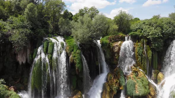 Beautiful and Wide Forest Waterfall