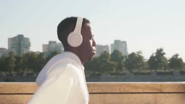 Man Jogging With His Eyes Closed alt