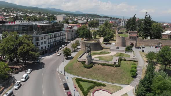 Aerial view of Monument of King Erekle II in Telavi. flying over Batonis Tsikhe alt