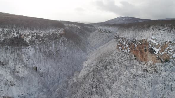 Aerial View of Plateau LagoNaki Mountain Twisted Road in the Winter and Driving Car alt