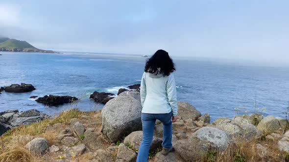 Asian Woman Hiking In Big Sur California alt