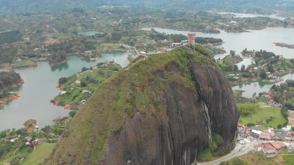 The Stone of El Penol, La Piedra del Penol in Colombia - aerial drone shot alt