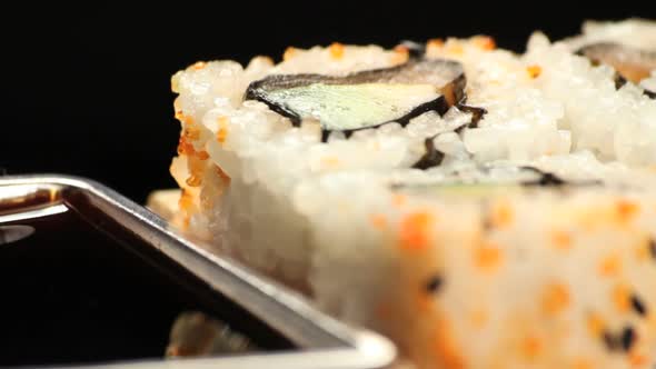 Sushis rotating close up in studio